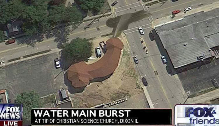 water main burst at tip of christian science church, unfortunate dick shaped church spraying water everywhere