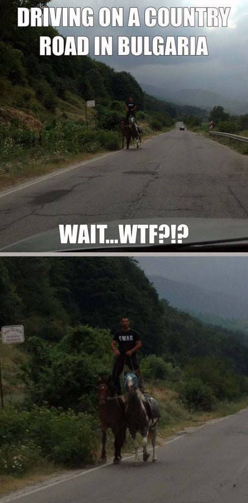 driving on a road in bulgaria, man riding two horses standing up, wait wtf