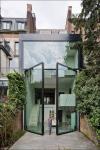 giant glass doors in back of house, epic architecture