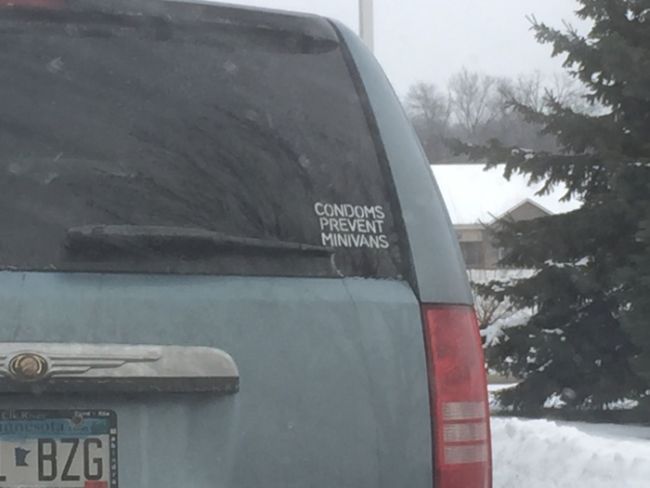 condoms prevent minivans, sticker on rear window of vehicle