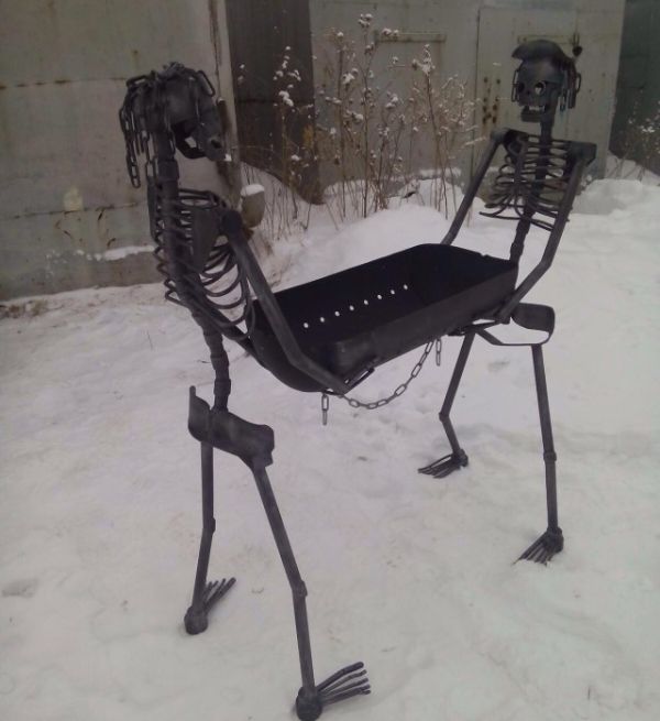 bbq held by two metal skeletons