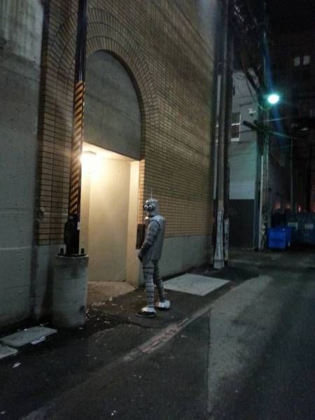 bender pissing in an alley way
