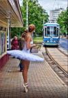 ballerina waiting for the train on her tip toes