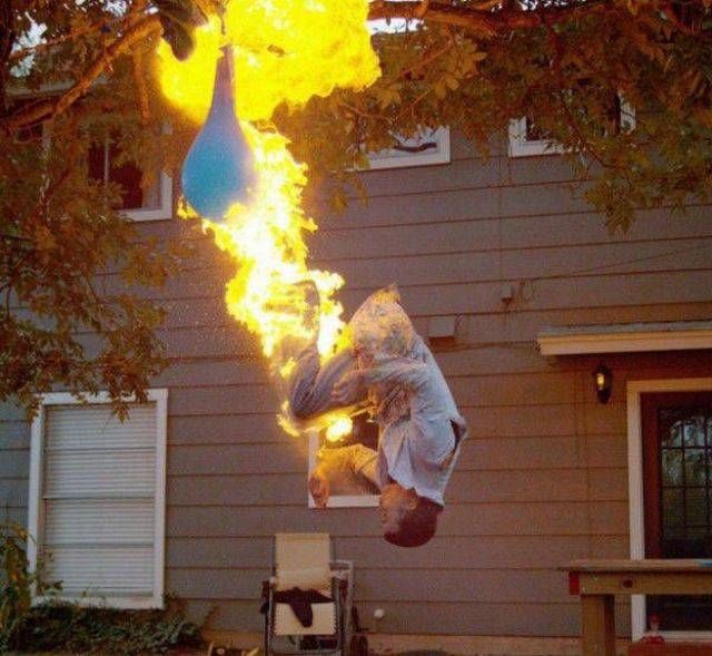 flame balloon falling from tree, wtf is going on here?