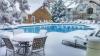 inviting outdoor in ground swimming pool in the winter