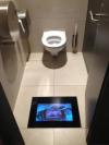 best bathroom ever, tv screen in floor below toilet