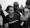 wetsuits and a knife with arnold flexing with pumping iron t-shirt