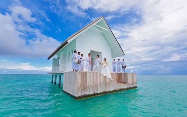 wedding in a church on stilts in the ocean
