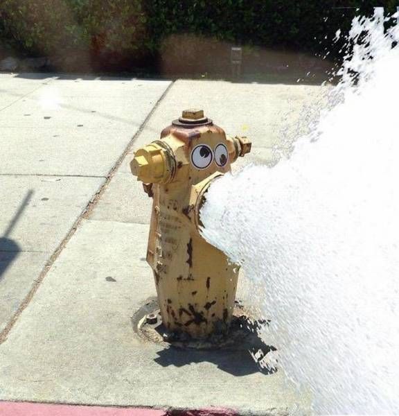 fire hydrant violently vomiting water