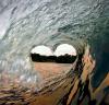 when surfing is your one true love, heart shape in a wave