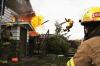 back draft explosion sends fireman flying