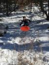flying saucer snow jump in mid air