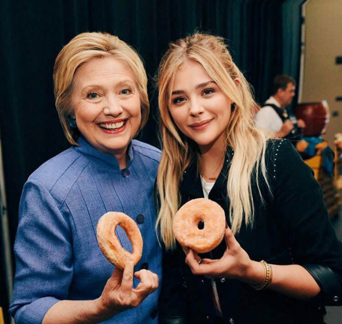 hillary clinton and chloë grace moretz showing off their donut holes