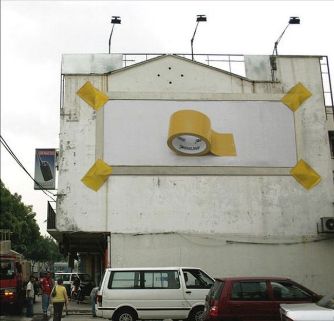 a brilliant ad for tape, taped billboard of tape