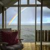 bright rainbow over the water, beautiful