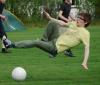 charlie brown syndrome, guy misses soccer ball kick and is photographed in mid air fall, fail, timing