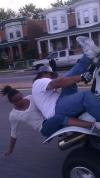 motorcycles are dangerous, photograph of a motorcycle wipe out taking place, timing