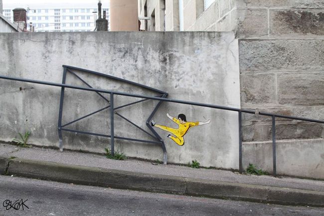 bruce lee causing damage to public property, street art