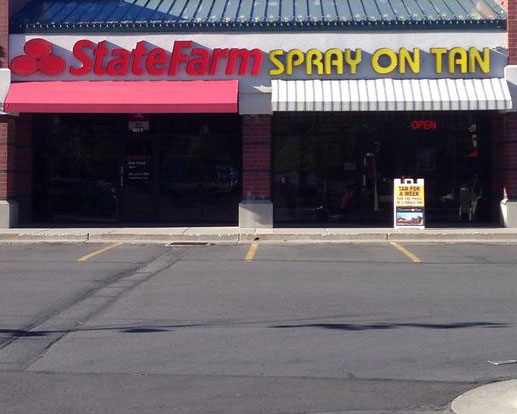 state farm spray on tan, awkward sign placement