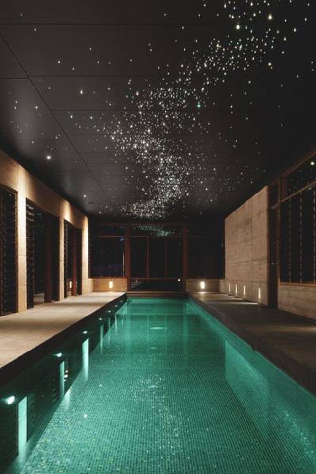 indoor pool with starry sky ceiling