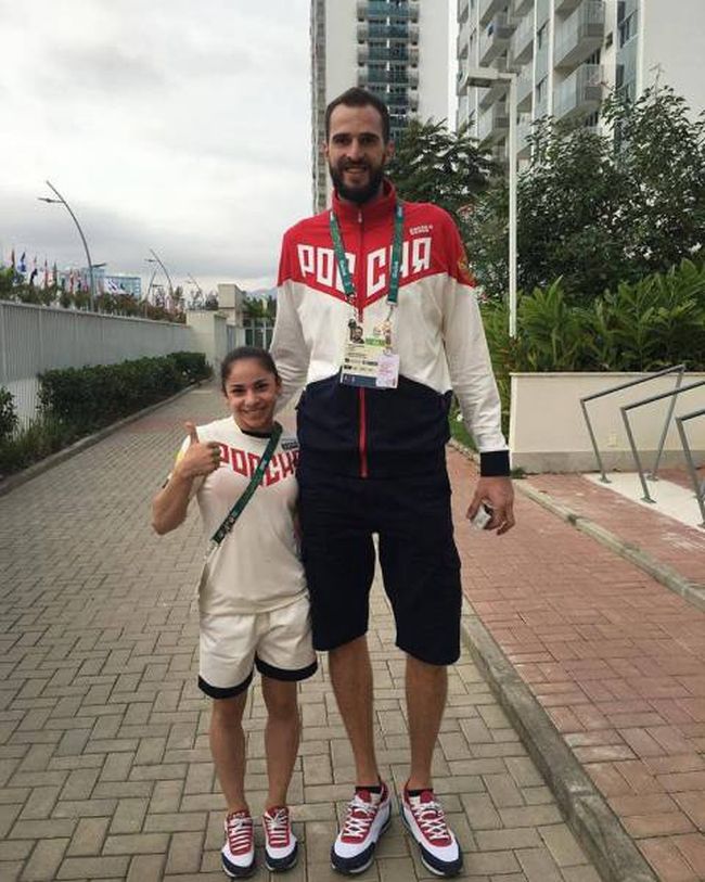 two russian olympians, short and tall