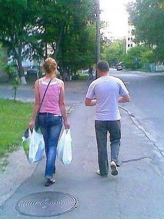 woman carrying groceries, chivalry is dead