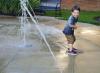 kid diverting water with his pants