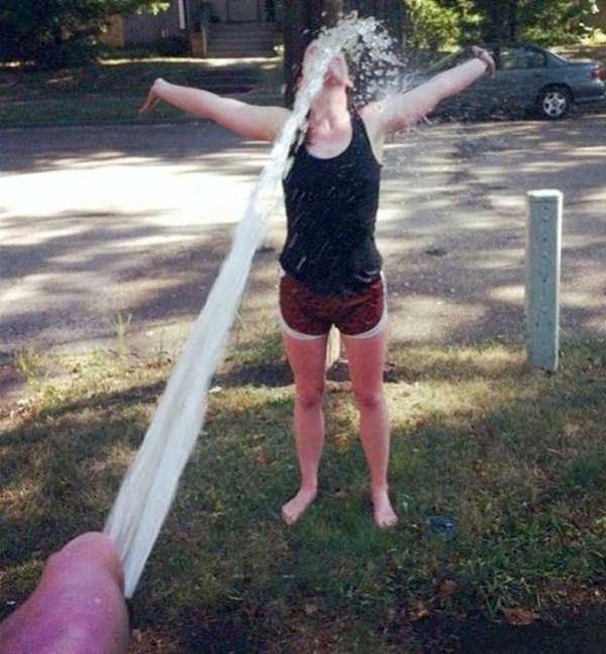 spraying your wife with water from the hose, awkward photos