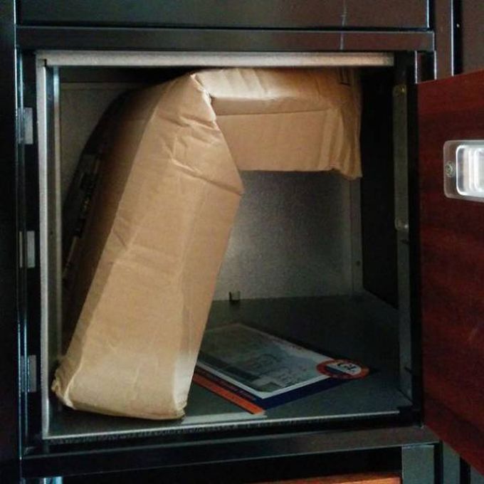 bent package in mailbox, delivery fail