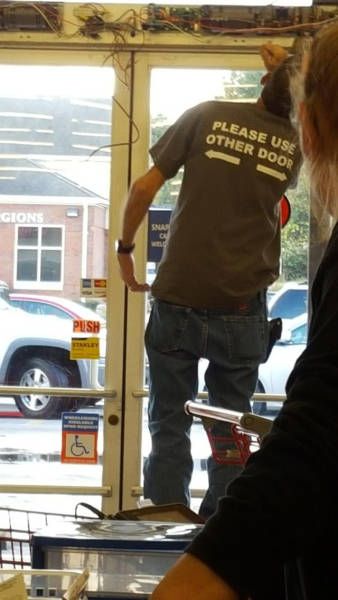 please use other door t-shirt on door repair man