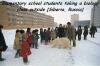 elementary school students taking a biology class outside, siberia, russia
