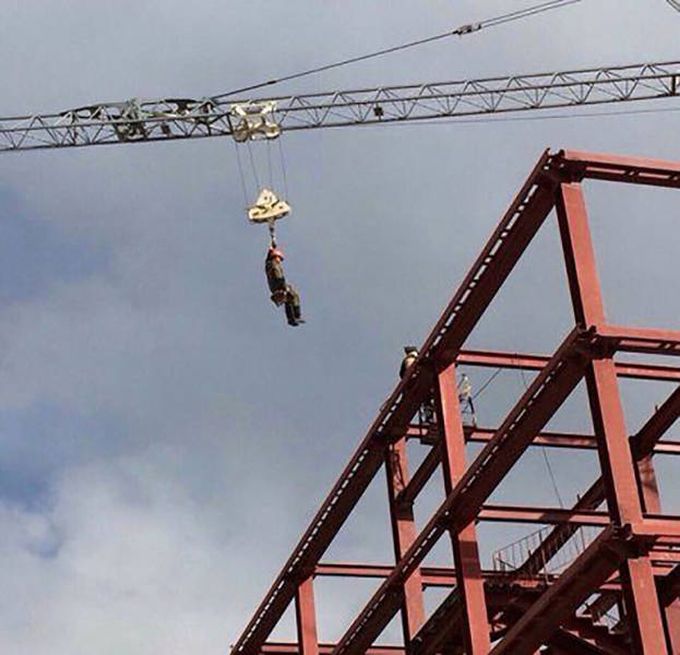 getting a ride from a crane operator, unsafe work place