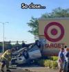 so close, car runs into target sign and just misses