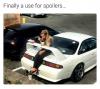 finally a use for spoilers, girl using car spoiler as impromptu table