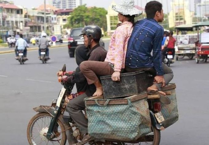 when safety is your last concern, people on motorbike