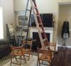 ladder on chairs, unsafe work conditions
