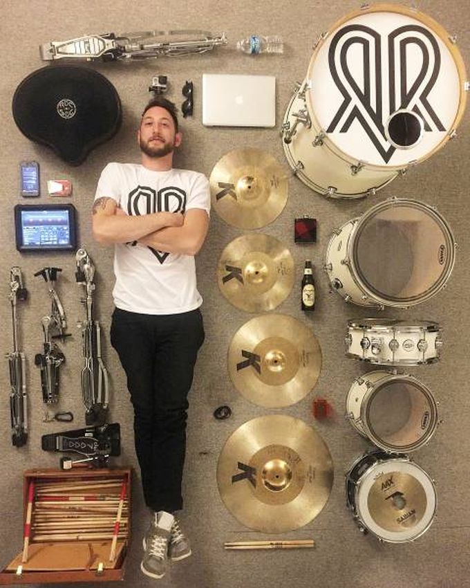posing next to your disassembled drum kit