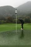 when the hole is also the water hazard, rain on a golf course