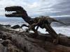 dinosaur made from driftwood on the beach, art, win