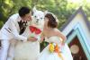 married couple kisses fat llama