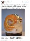 cocktail suggestion for jan 20, the nye my president, white russian beneath a thing orange skin and fake gold leaf garnish