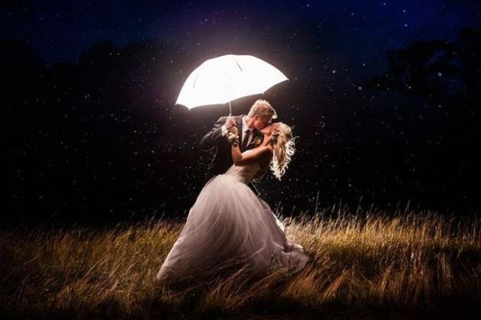 umbrella of light wedding photo