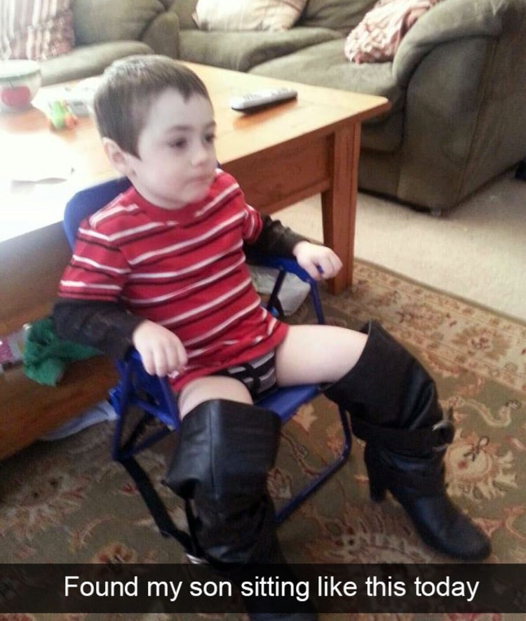 found my son sitting like this today, big black boots on kid
