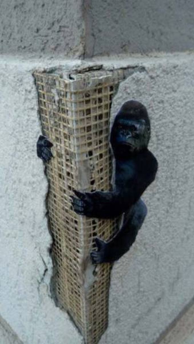 king kong street art on building structure exposure