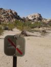 no swimming sign in the desert