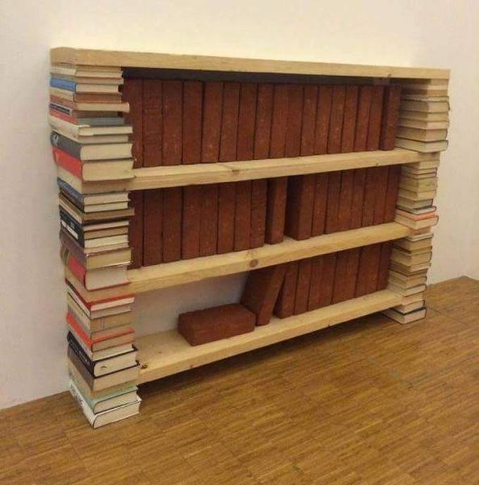 this is a real book shelf, bricks on book shelf