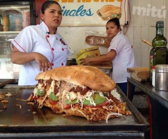 giant sandwich on grill