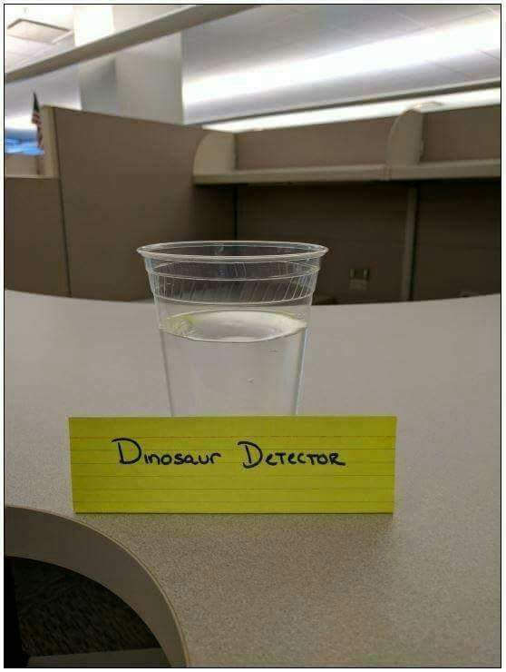 dinosaur detector, glass of water
