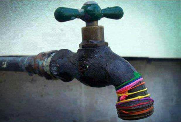 a vision of childhood fun, water faucet with broken water balloon rubber