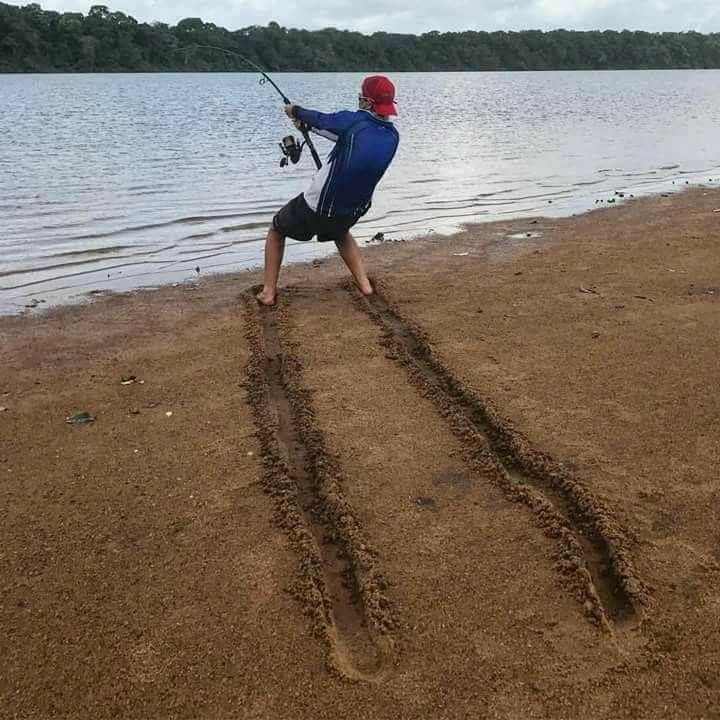 when the fish is powerful, feet lines in sand